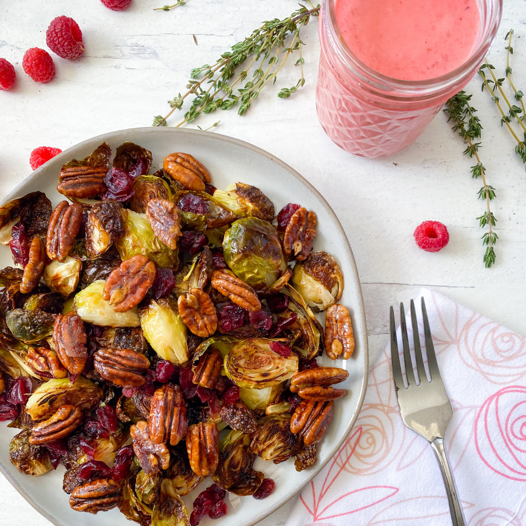 roasted Brussel sprouts with candied pecans, dried cranberries and an organic raspberry vinaigrette