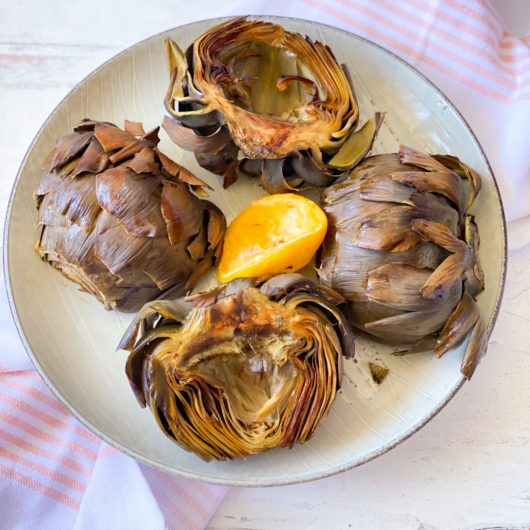 Oven Roasted Artichoke Halves Girl Appetit