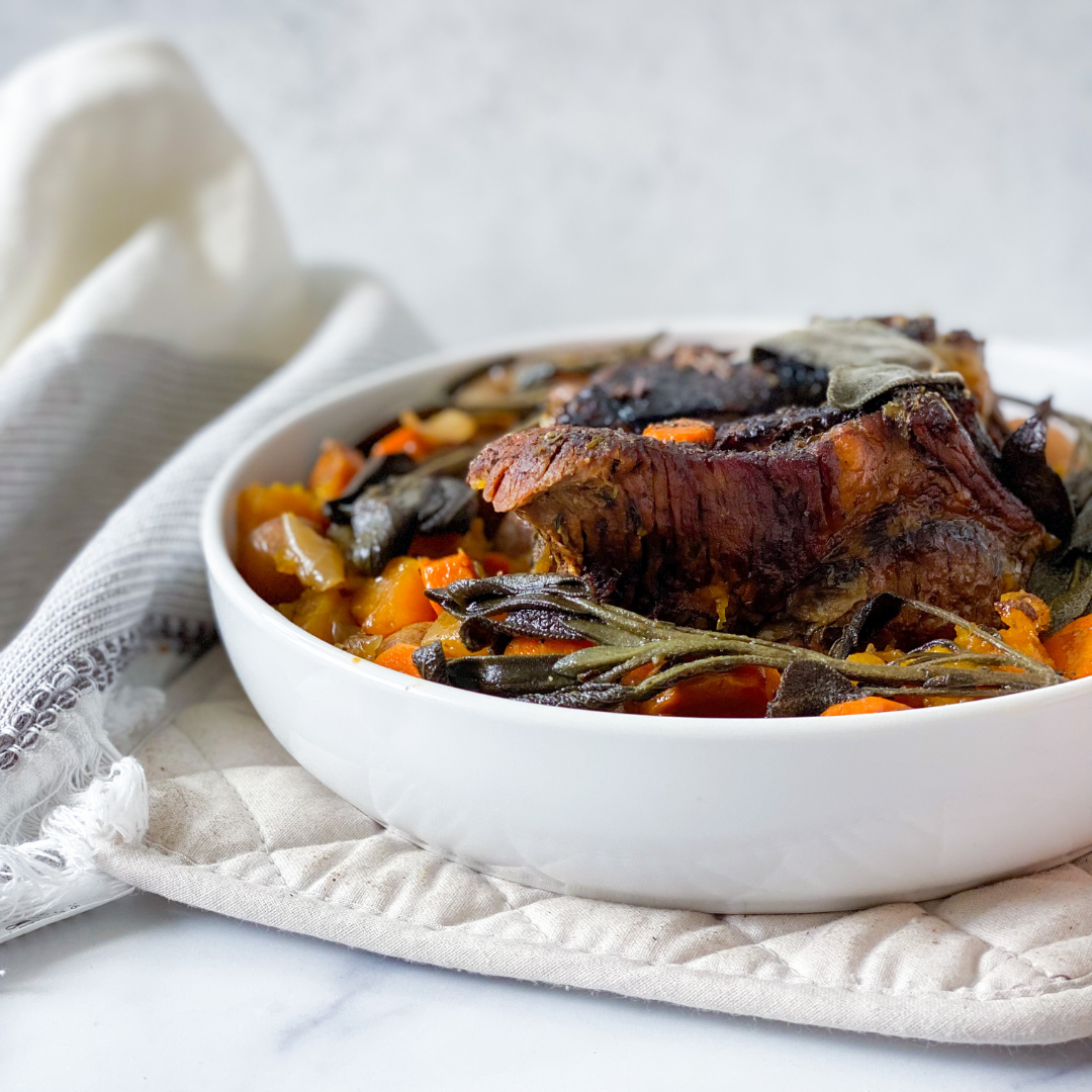 chuck roast with butternut squash in serving bowl