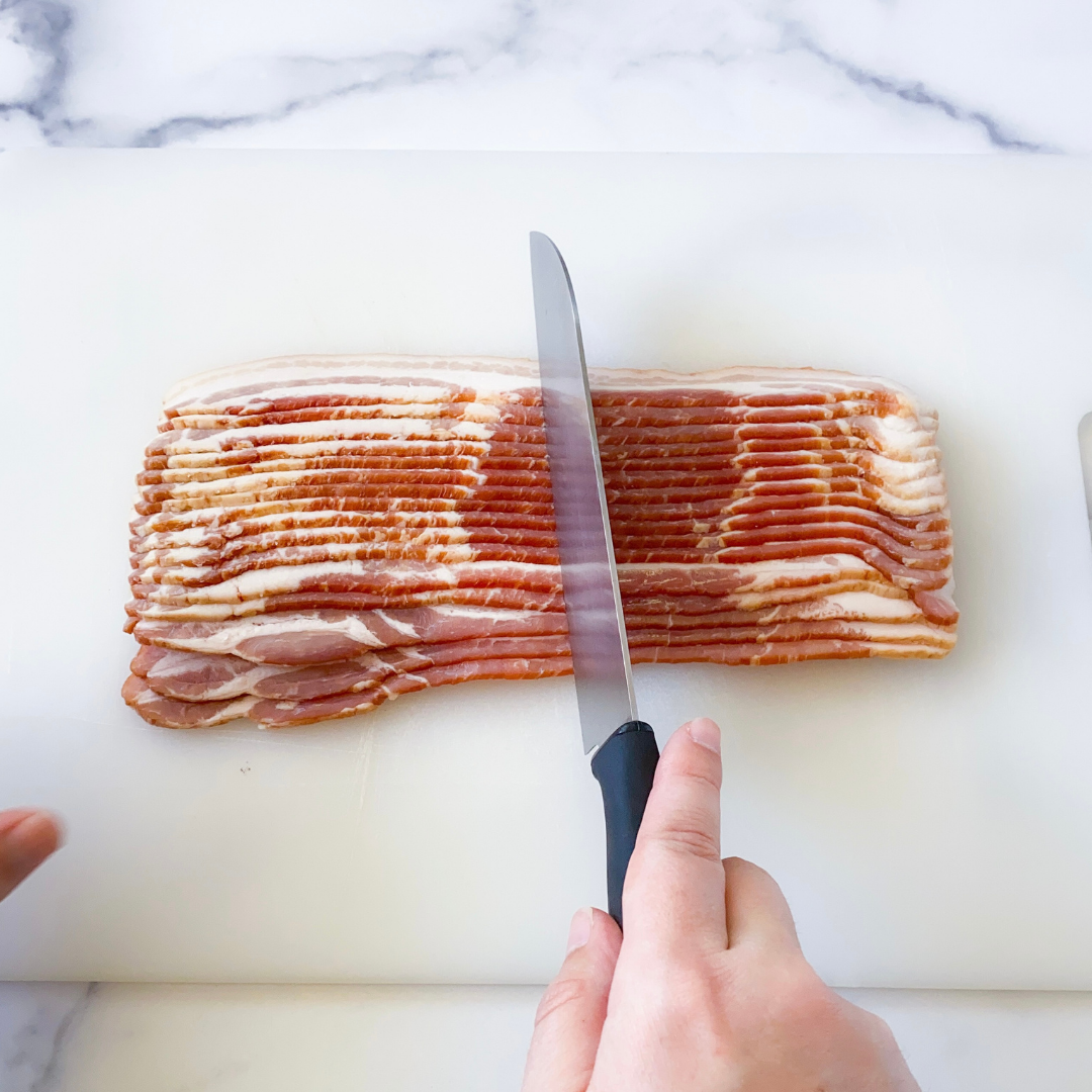 cutting bacon for bacon wrapped water chestnuts